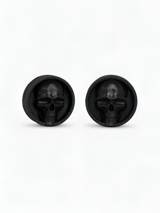 Pair of black Dark gaze double flared ear plugs on a white background