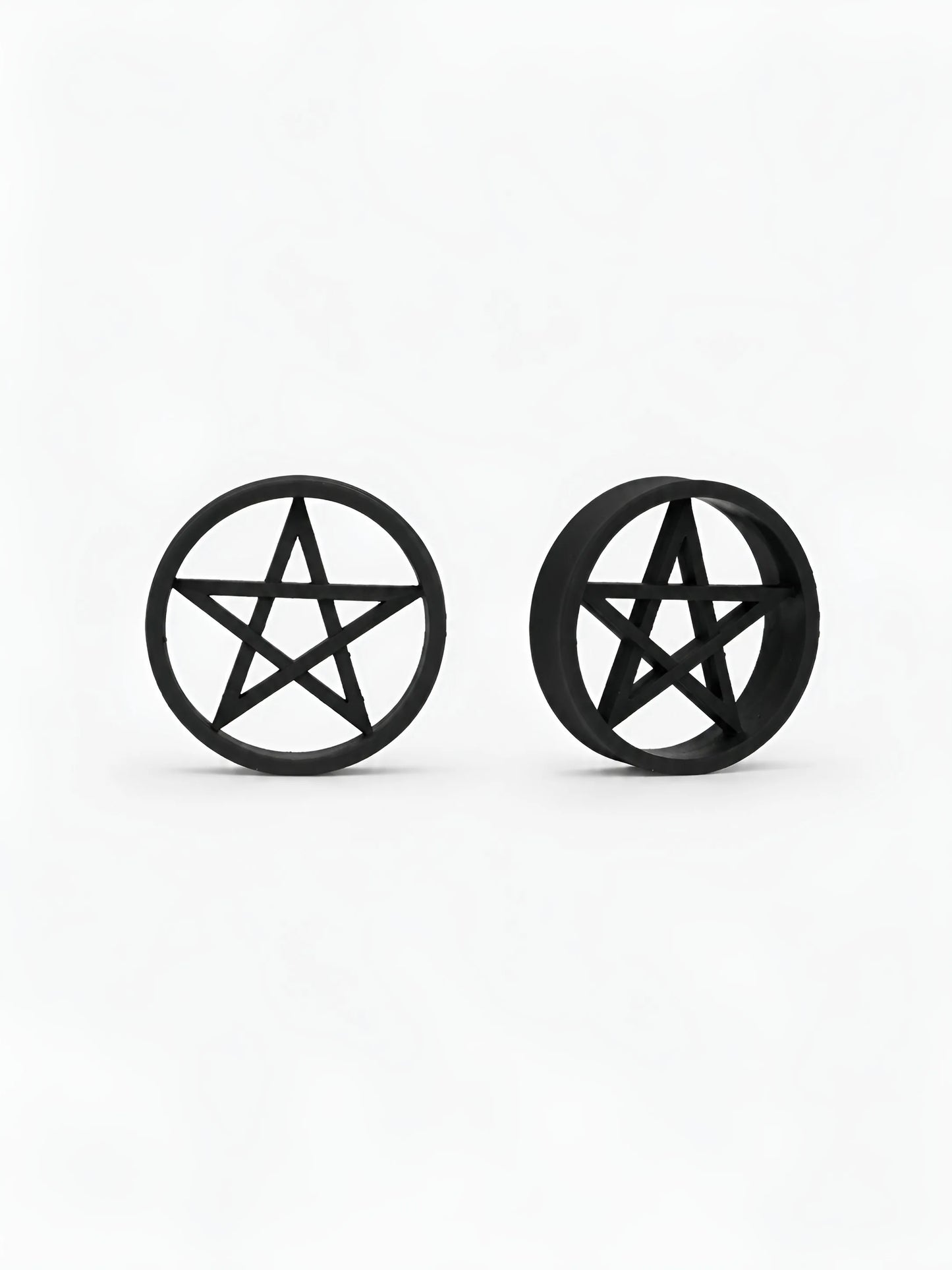 Pair of black Pentacle double flared ear tunnels on a white background